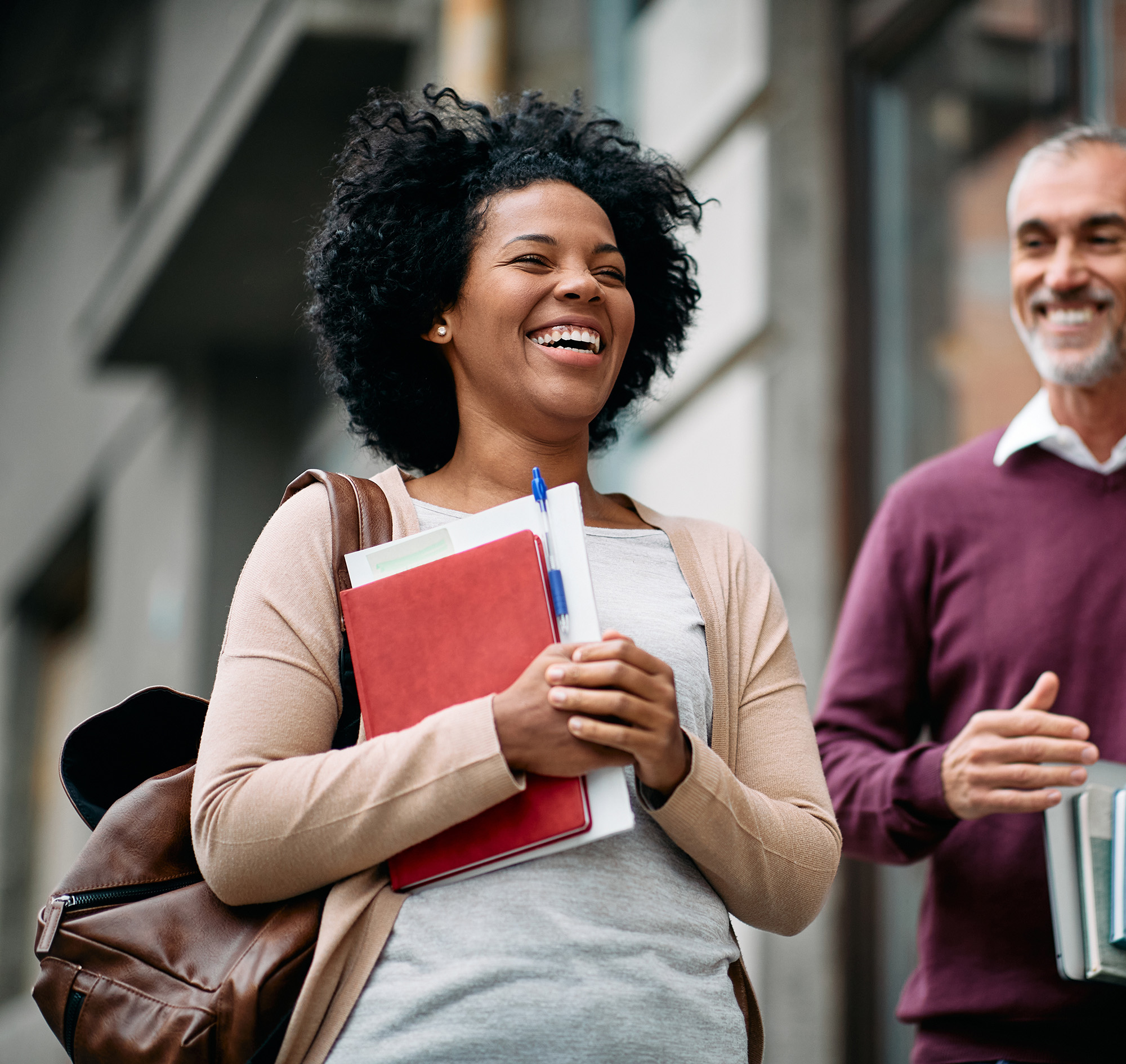 Students laughing as they're walking